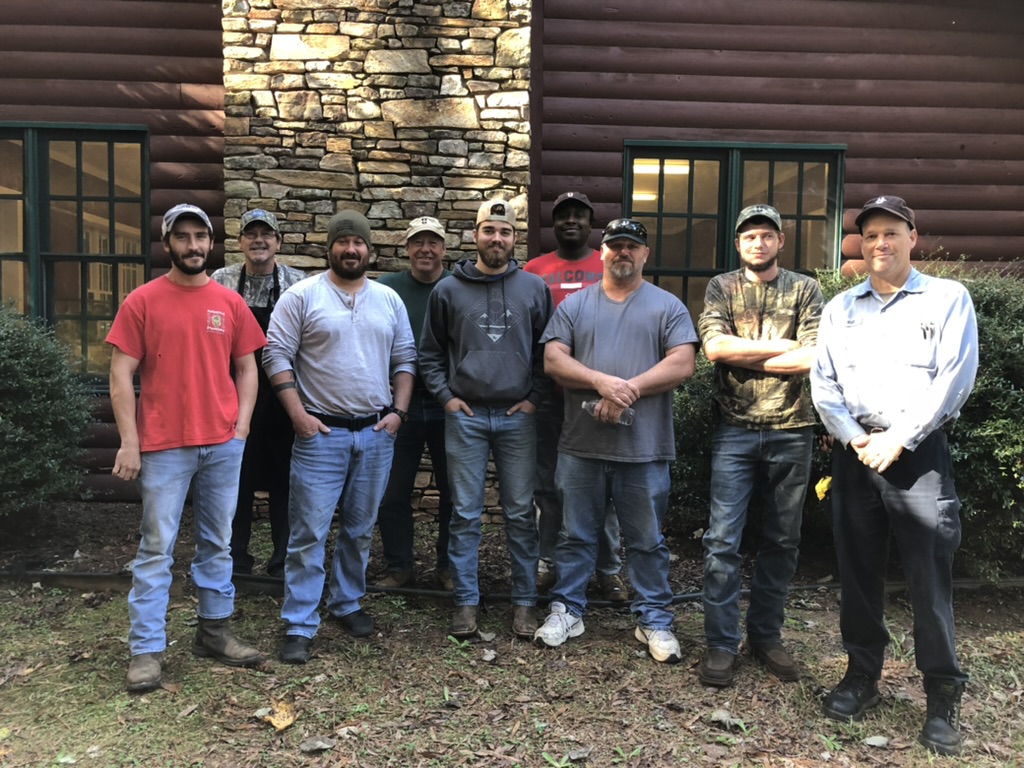 Outdoor University participants learning together at camp